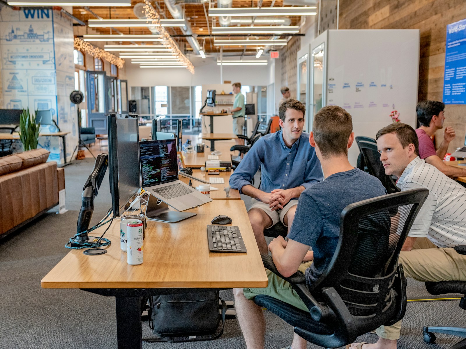 Professionals sharing ideas around a meeting table